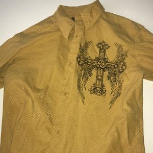 Yellow button up shirt with crosses on it